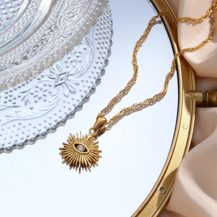 Collier pendentif oeil avec rayons vintage plaqué or - MonPendentif
